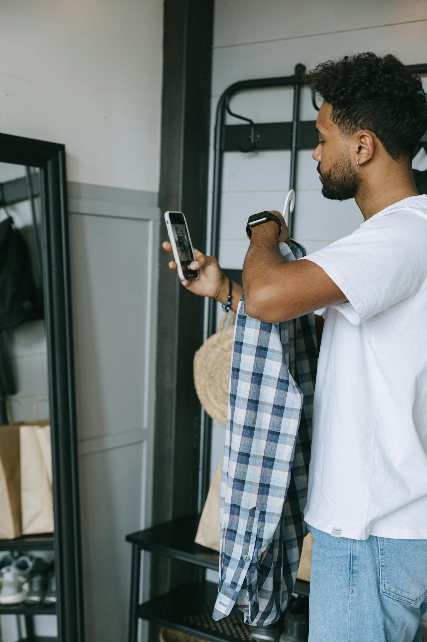 Man in White Dress Shirt Holding Smartphone